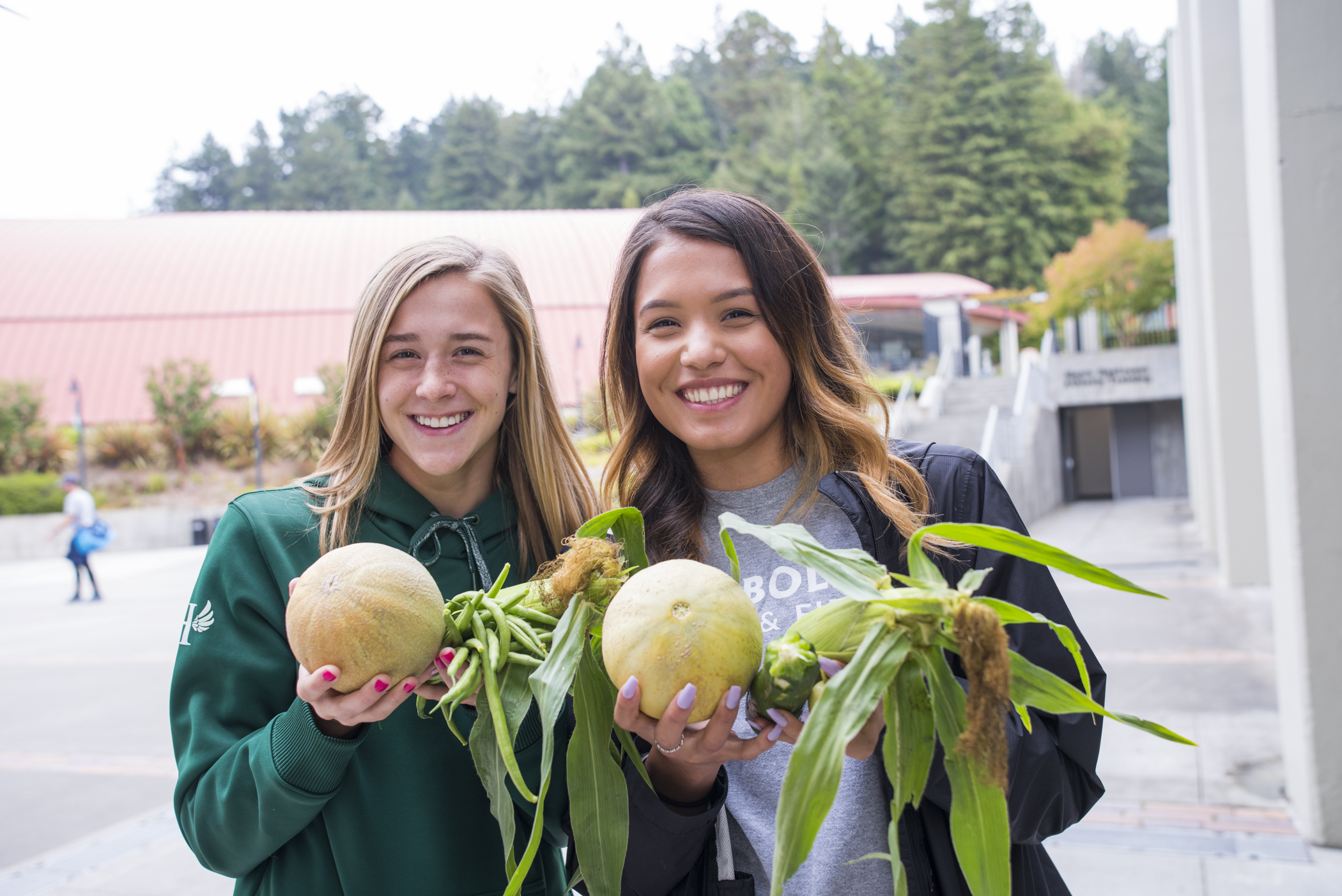 Students with fresh fruits and vegetables
