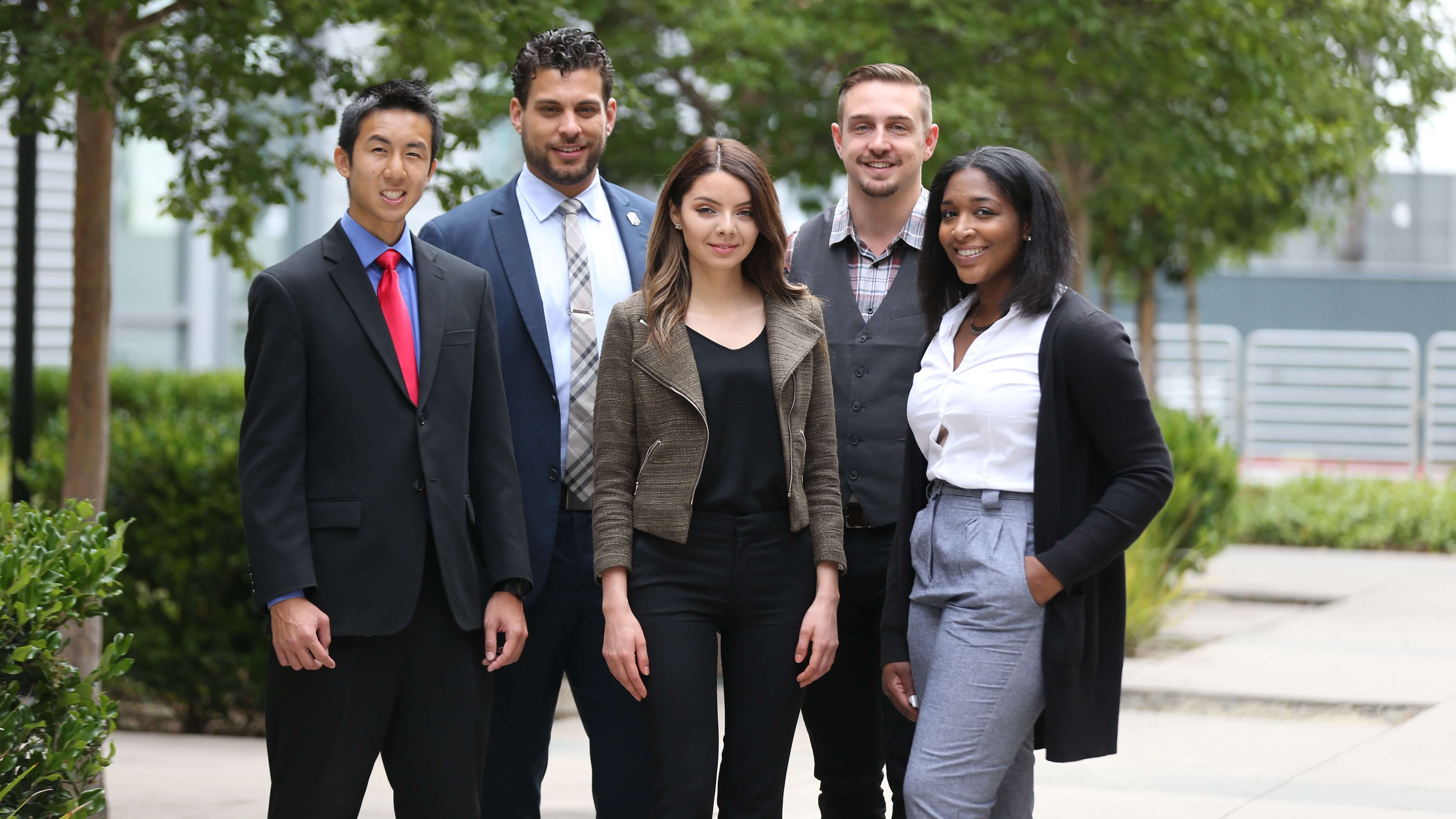 five college students wearing business attire