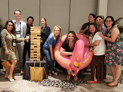 Counterparts 2018 attendees playing Jenga during the scholarship games
