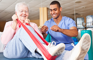Occupational Therapist working with a patient