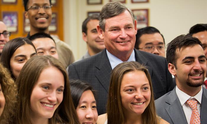 Chancellor White with students at Cal State Fullerton in 2016.