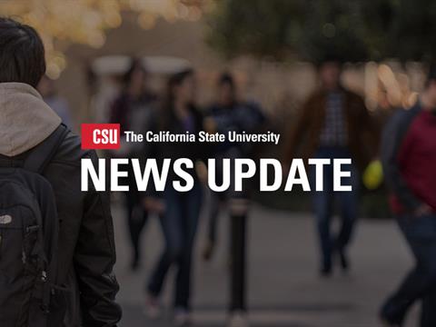 Student walking on campus with the copy &quot;News Update&quot; across the middle.