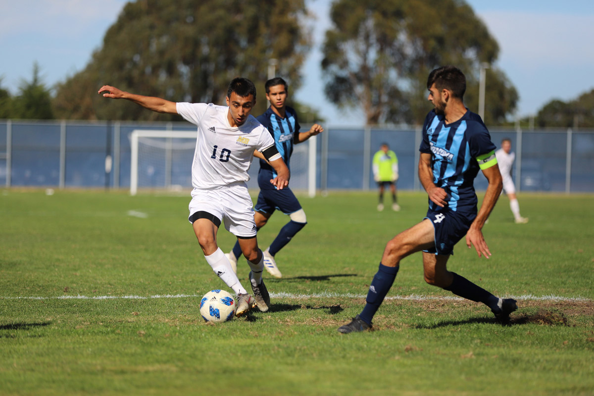 Monterey BayCSU Monterey Bay’s Adrian Rebollar makes his way up the field in a soccer match against Sonoma State on November 6, 2019.