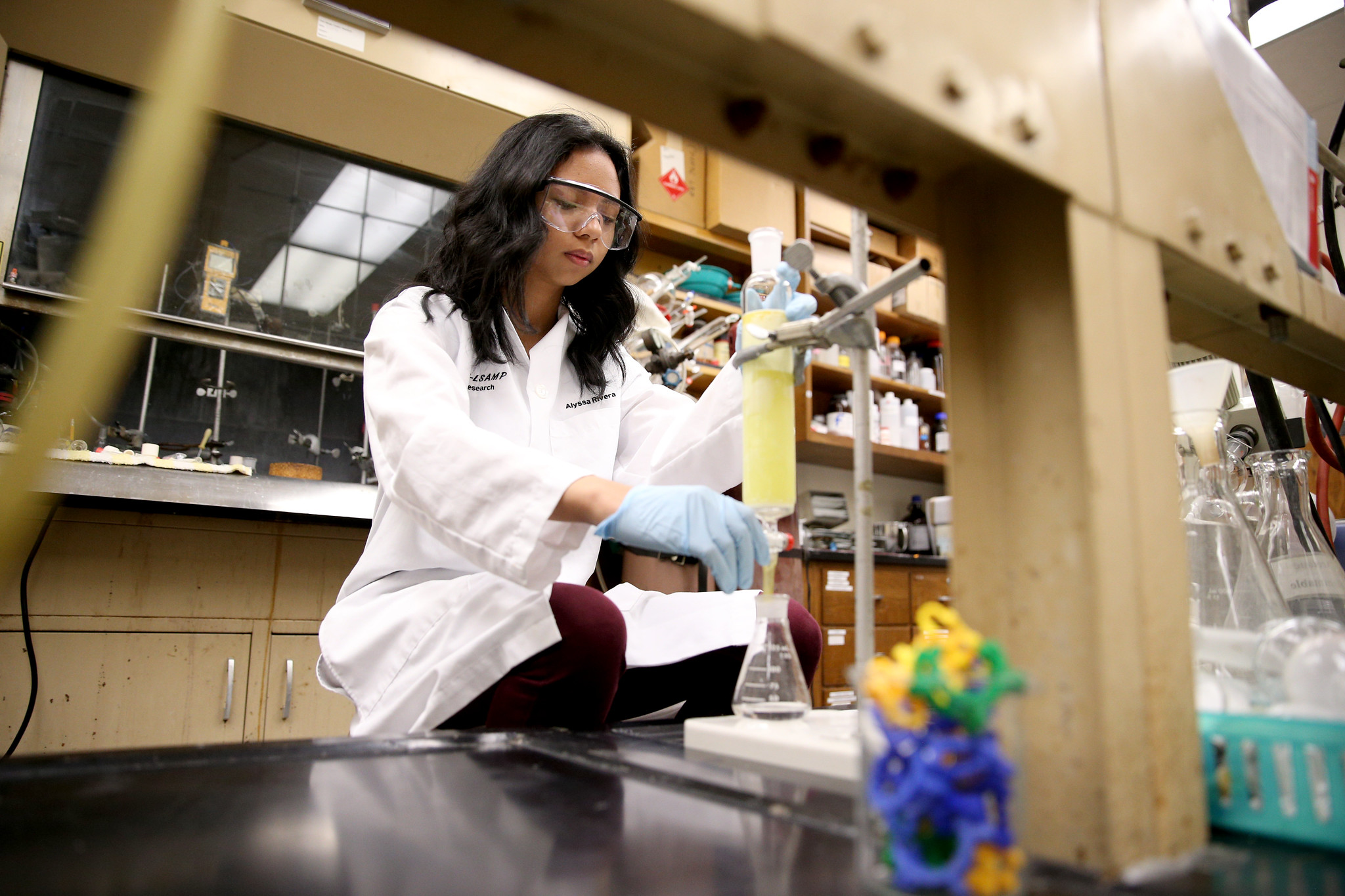 female student working in a college laboratory