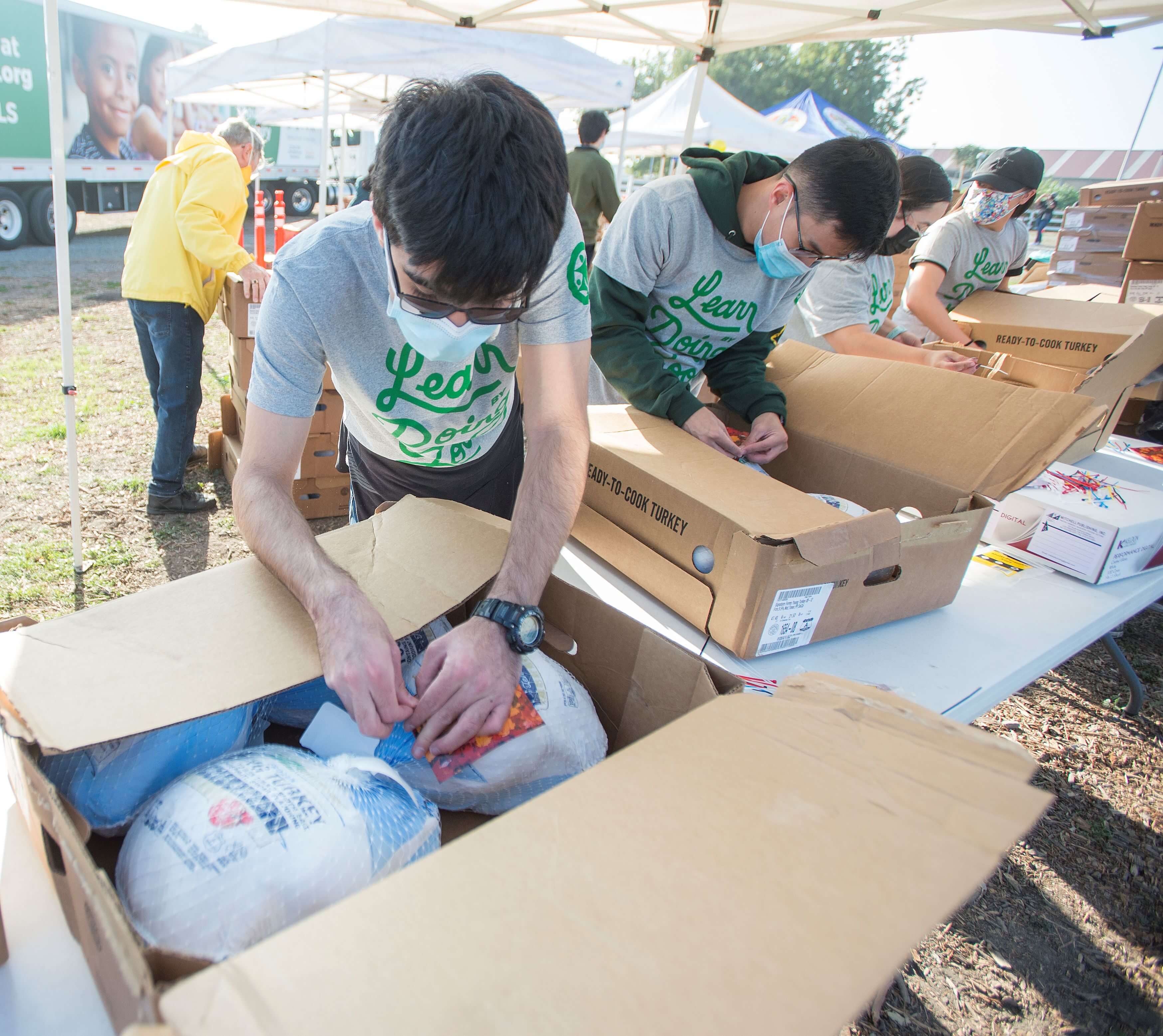 Students volunteer for the Operation Gobble Gobble Turkey Distribution at Cal Poly Pomona.