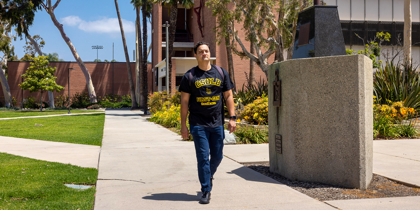 Jose Campos Ramos walks across the CSULB campus.
