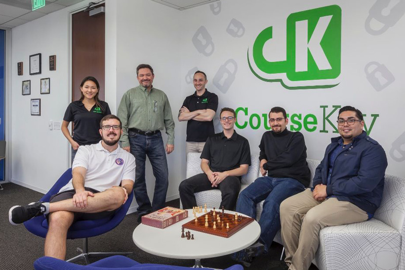 CourseKey employees pose for a photo.