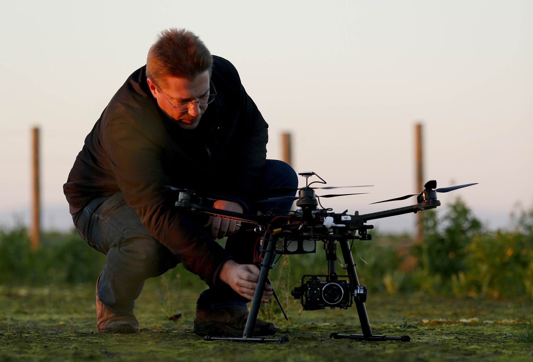 Dr. Gregory Kriehn works on a drone.