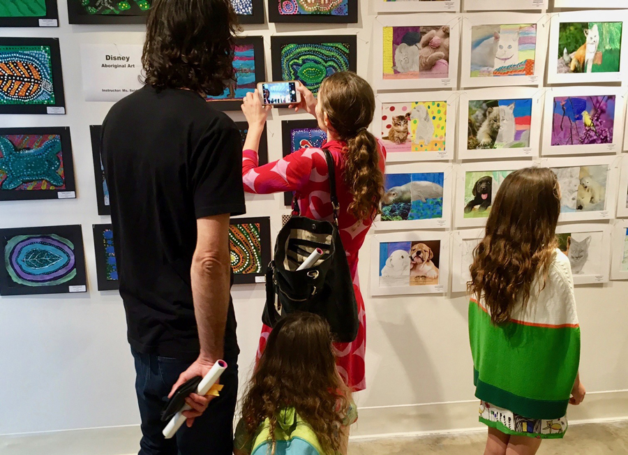 RHS Fine Arts Gallery visitors peruse artwork at the annual Children’s Exhibition, which closes out the Los Angeles Unified School District’s free 24-week Saturday Conservatory of Fine Arts program.