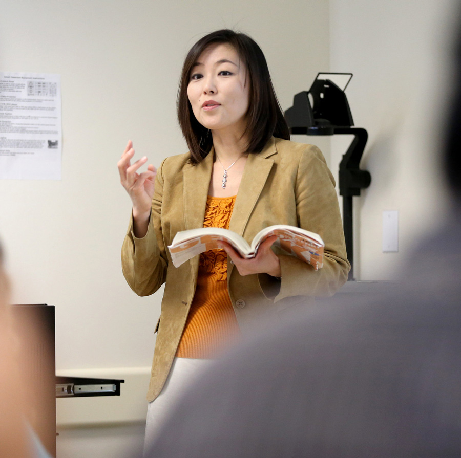 Cal State San Bernardino lecturer Makiko Amaya in front of her class.