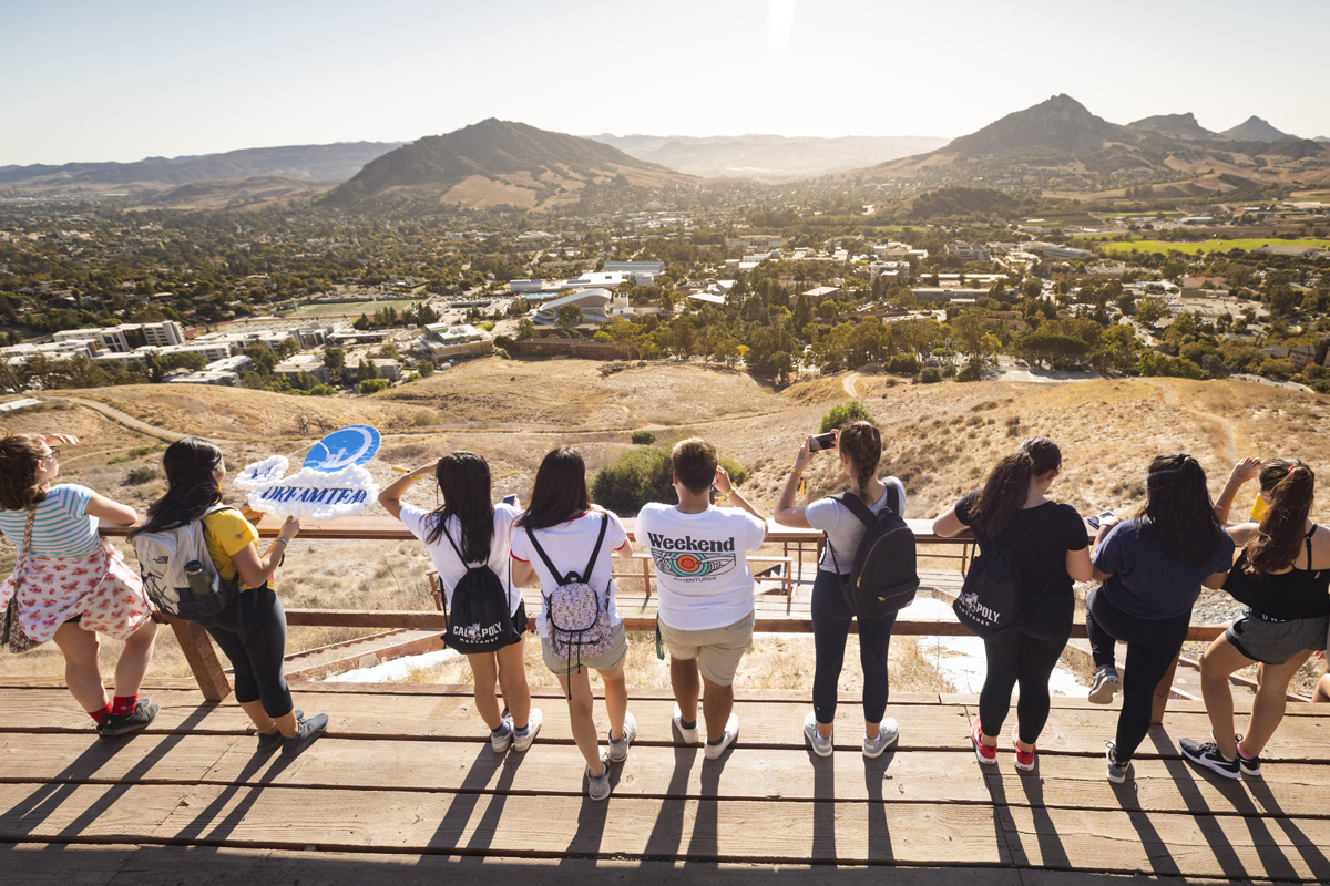 Students take in the sights during an afternoon fall hike to the Cal Poly P