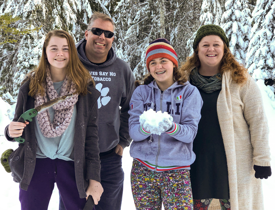 Rachael Thacker and her family in the snow.