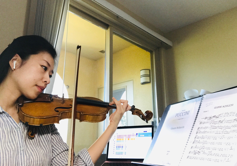 Violinist Jeongah Moon rehearses a musical piece for the opera “Gianni Schicchi.”