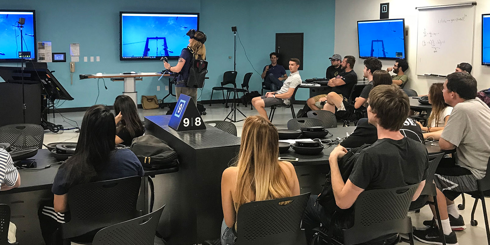 SDSU Instructor Linnea Zeiner mirrors her headset display during a class in one of the campus’s Learning Research Studio classrooms (photo predates COVID-19).