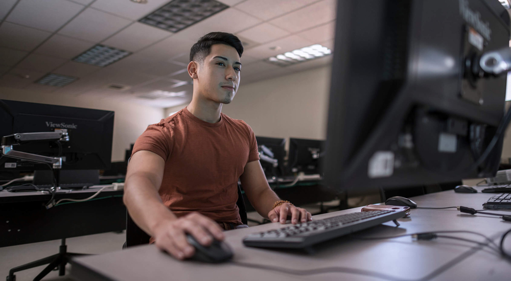 Student working at computer.