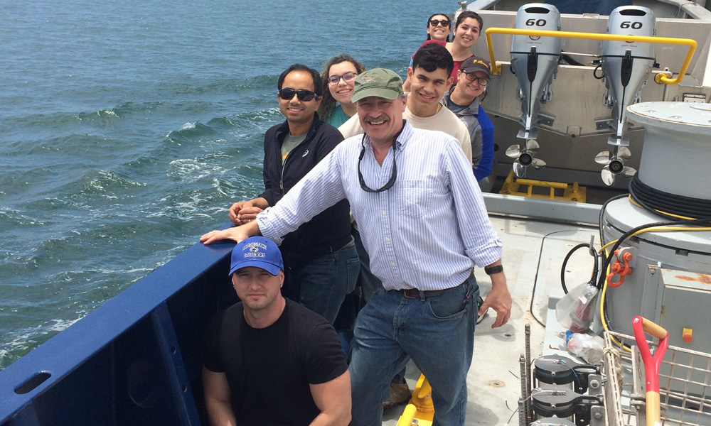 CSU Bakersfield undergraduates and Dr Anthony Rathburn aboard a research vessel