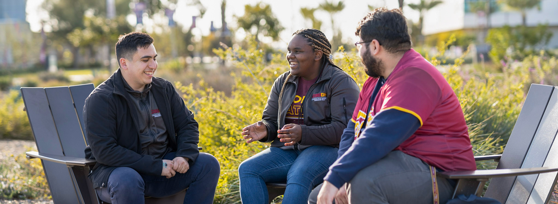 Three students talking