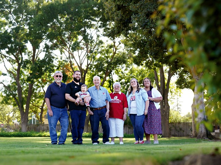 Craig Collins pictured beside his family, three generations of Fresno State Bulldogs
