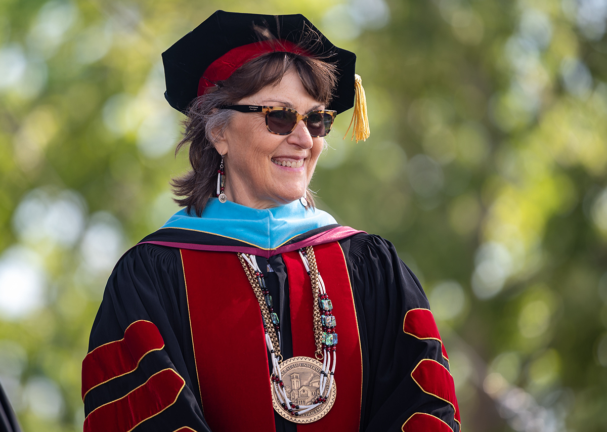 Chico State President Gayle Hutchinson speaking at a graduation ceremony.