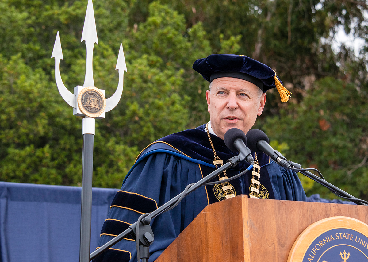 Cal Maritime President Cropper at podium during graduation ceremony