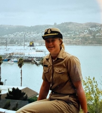 A young woman wearing a cadet uniform 
