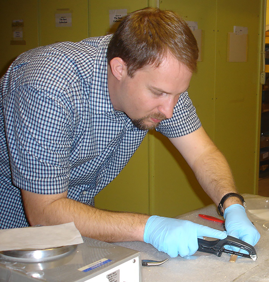 Dr. Eric Bartelink works in a lab.