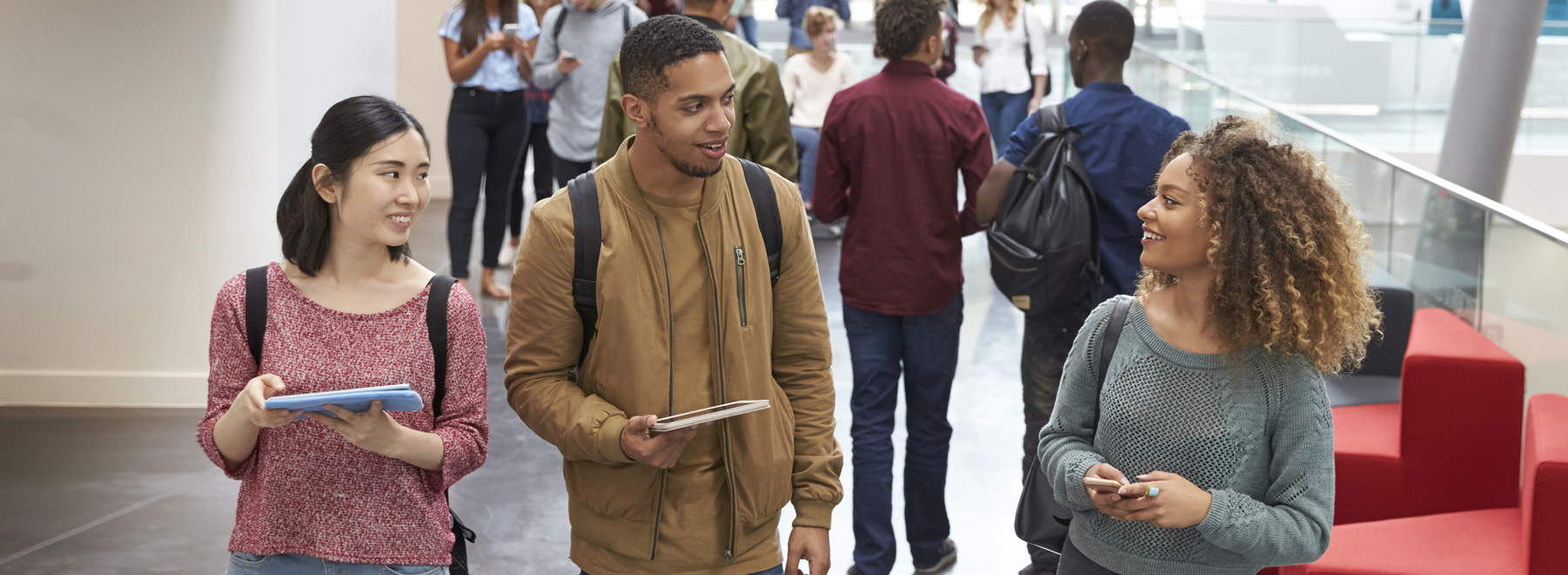 Students looking at tablet